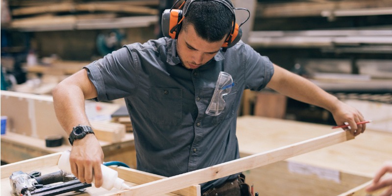 carpenter glueing wood