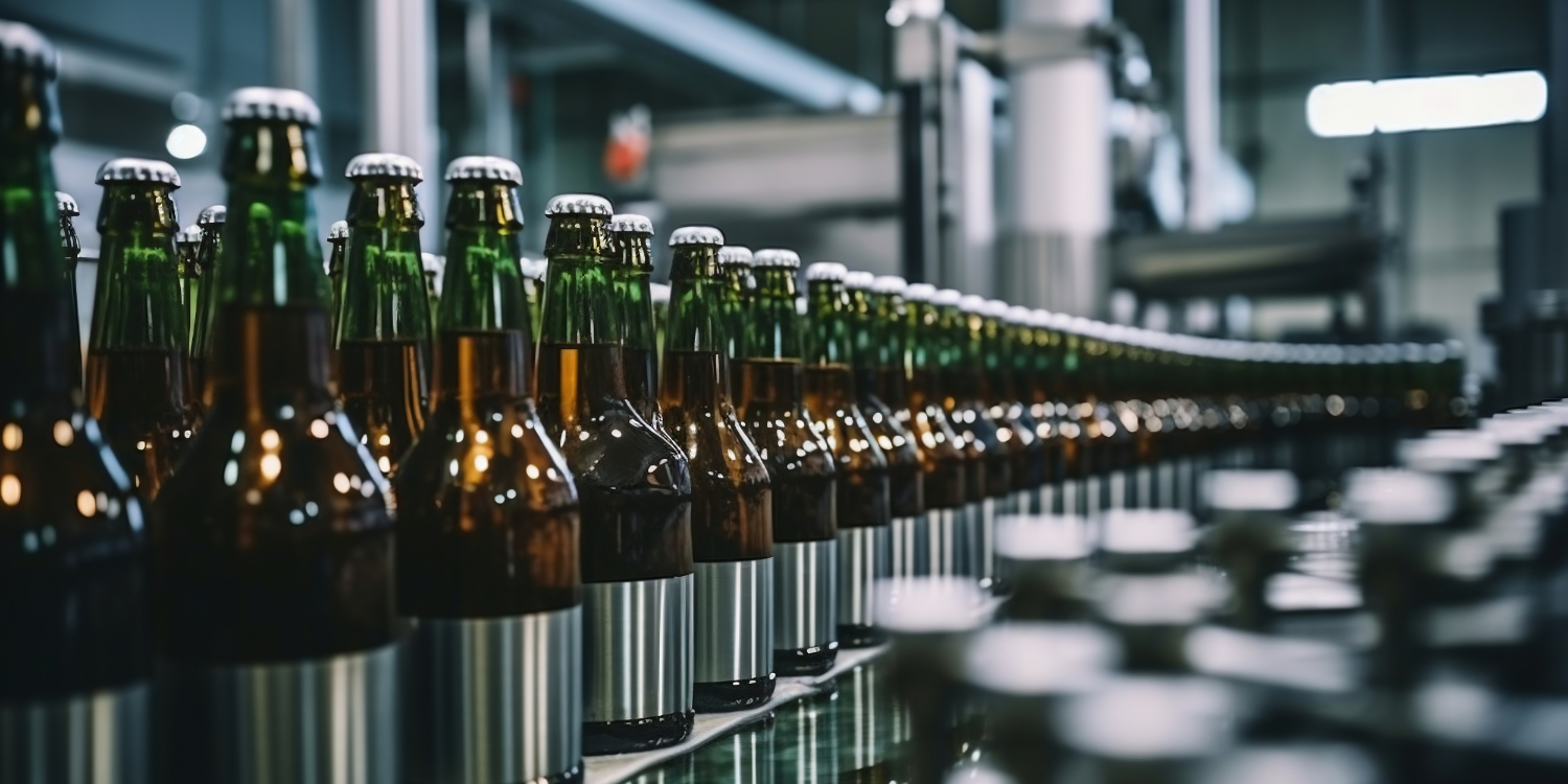 Bottling and labeling machine in factory - What’s New in Adhesives: Improve Your Application