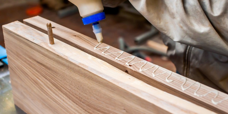 Carpenter gluing boards together - Adhesive Safety, Risks & More: Your Top Questions Answered